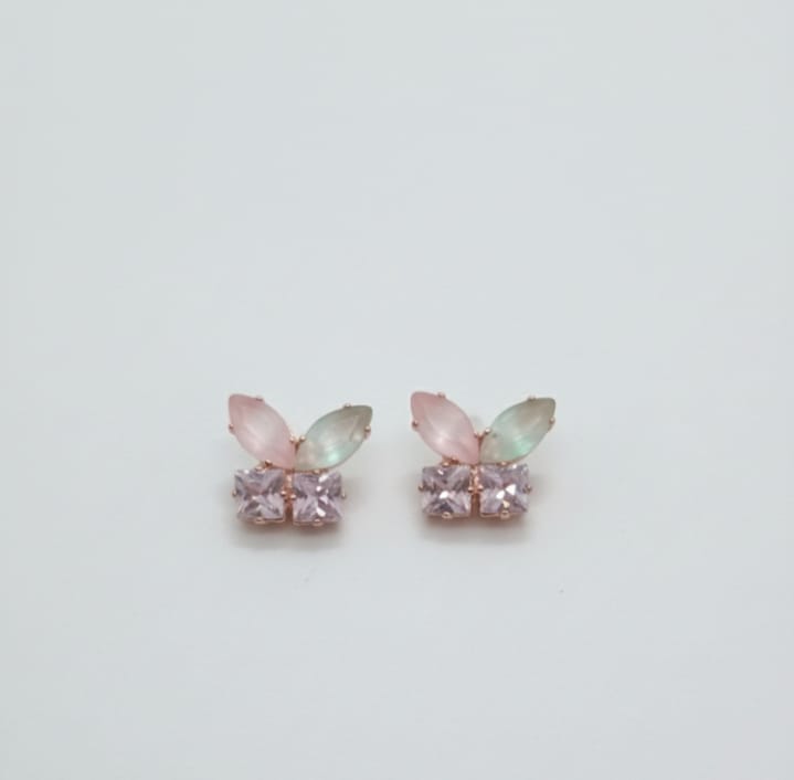 lovely  butterfly-inspired design with mixed pastel stones and cubic zirconia on a rose gold base